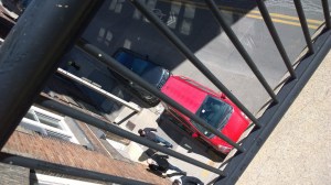 040115-red-car-from-bridge