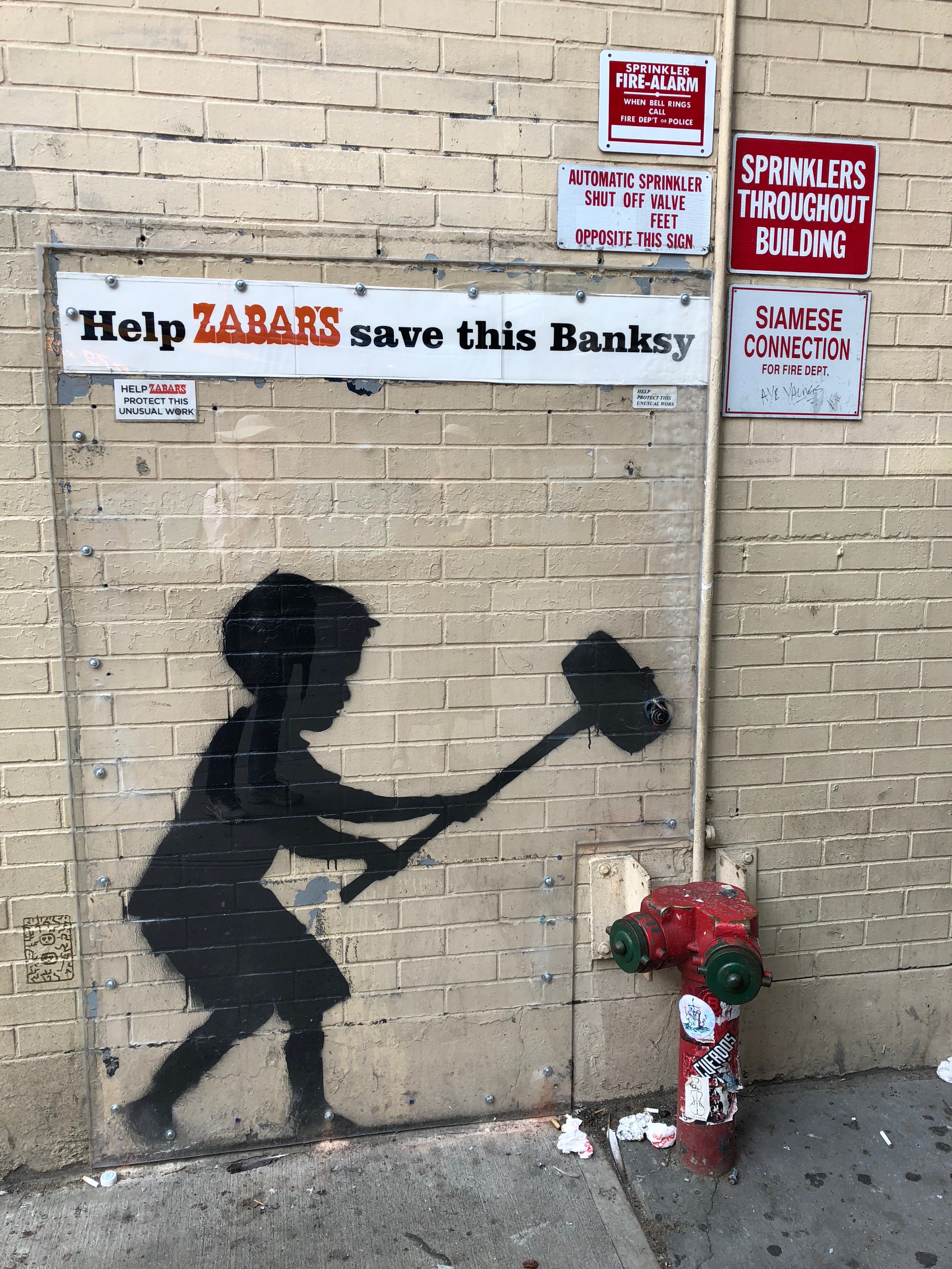 091918-Banksy-tagged-5-NYC-boroughs-in-2013